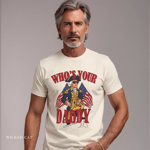 Man wearing a t-shirt with 'Who's Your Daddy' graphic design on a plain background