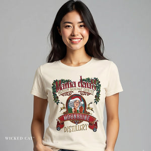 Woman wearing a t-shirt with a festive design of a woman and text on a gray background