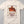 Ivory t-shirt with Holiday graphic of a tequila label, turkey holding a shot of tequila and text 'Turkey Time Tequila Keeping Family Time Fun Since 1810'