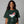 woman wearing a green Christmas margarita t-shirt