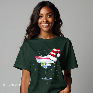 woman wearing a green Christmas margarita t-shirt