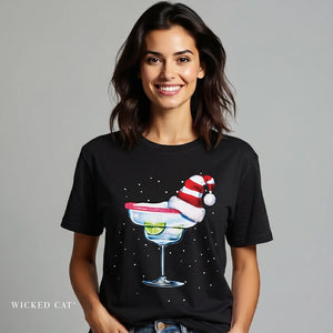 Woman wearing a black t-shirt with a Christmas-themed cocktail graphic on a gray background