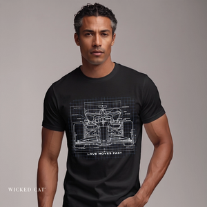 Man wearing a black t-shirt with a car blueprint design and text on a plain background
