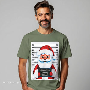 Man wearing a green t-shirt with a graphic of Santa Claus from a mugshot design on a gray background.