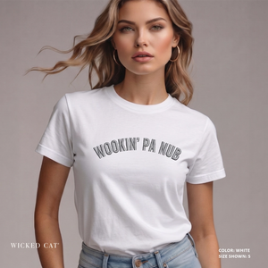 Woman wearing a white t-shirt with 'WOOKIN' PA NUB' text on a plain background