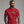 Man wearing a red t-shirt with 'EWW, PEOPLE' text on a plain background
