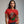 Person wearing a Natural t-shirt with 'Nightmare on Elm Freddy Halloween' design on a plain background