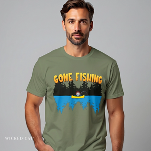 Man wearing a green t-shirt with 'Gone Fishing' graphic design on a gray background