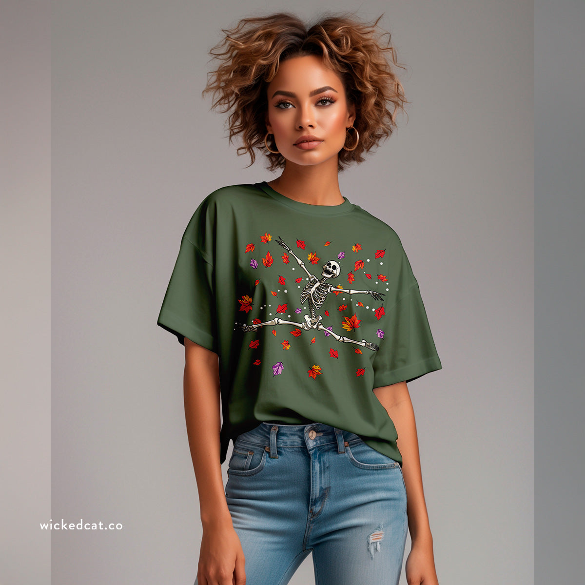 Beige Halloween t-shirt with a skeleton and leaf design on a white background