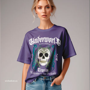 Person wearing a black t-shirt with 'Tequila Lovers Sugar Skull' design on a plain background