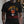 Person wearing a pink t-shirt with 'Wild Turkey Funny Holiday' design on a plain background