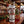 Tumbler with Santa Claus design on a bar counter with Christmas decorations
