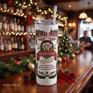 Tumbler with Santa Claus design on a bar counter with Christmas decorations