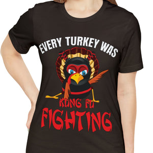 Olive t-shirt with 'Kung Fu Fighting Turkey 80s Music Funny' design on a white background
