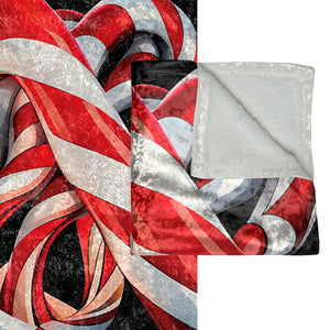Soft sherpa blanket with 'Candy Cane Twists Holiday Throw' design