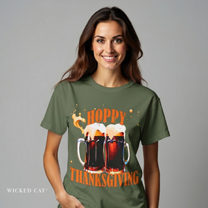 Woman wearing a green t-shirt with 'Hoppy Thanksgiving' design on a gray background
