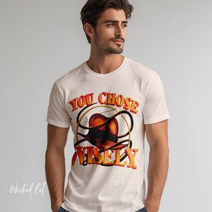 Person wearing a dark gray t-shirt with '80s Movies Pop Culture Action Novelty' design on a plain background