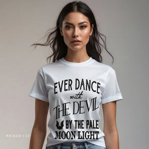 Person wearing a red t-shirt with 'Batman Joker Quote Funny' design on a plain background