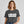 Person wearing a berry t-shirt with 'Make it Make Sense Sarcastic Funny Quotes' design on a plain background
