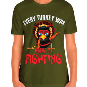 Person wearing a navy blue t-shirt with 'Kung Fu Fighting Turkey 80s Music Funny' design on a plain background